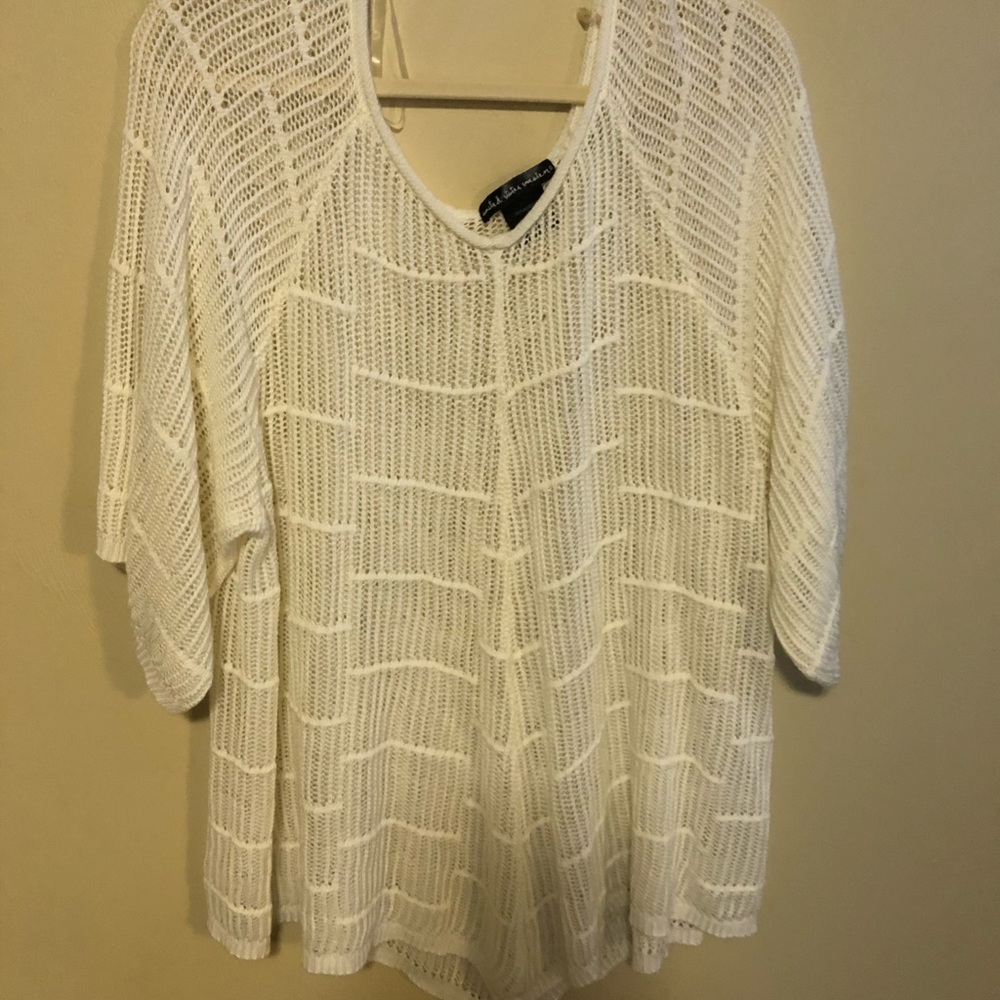 White poncho sweater